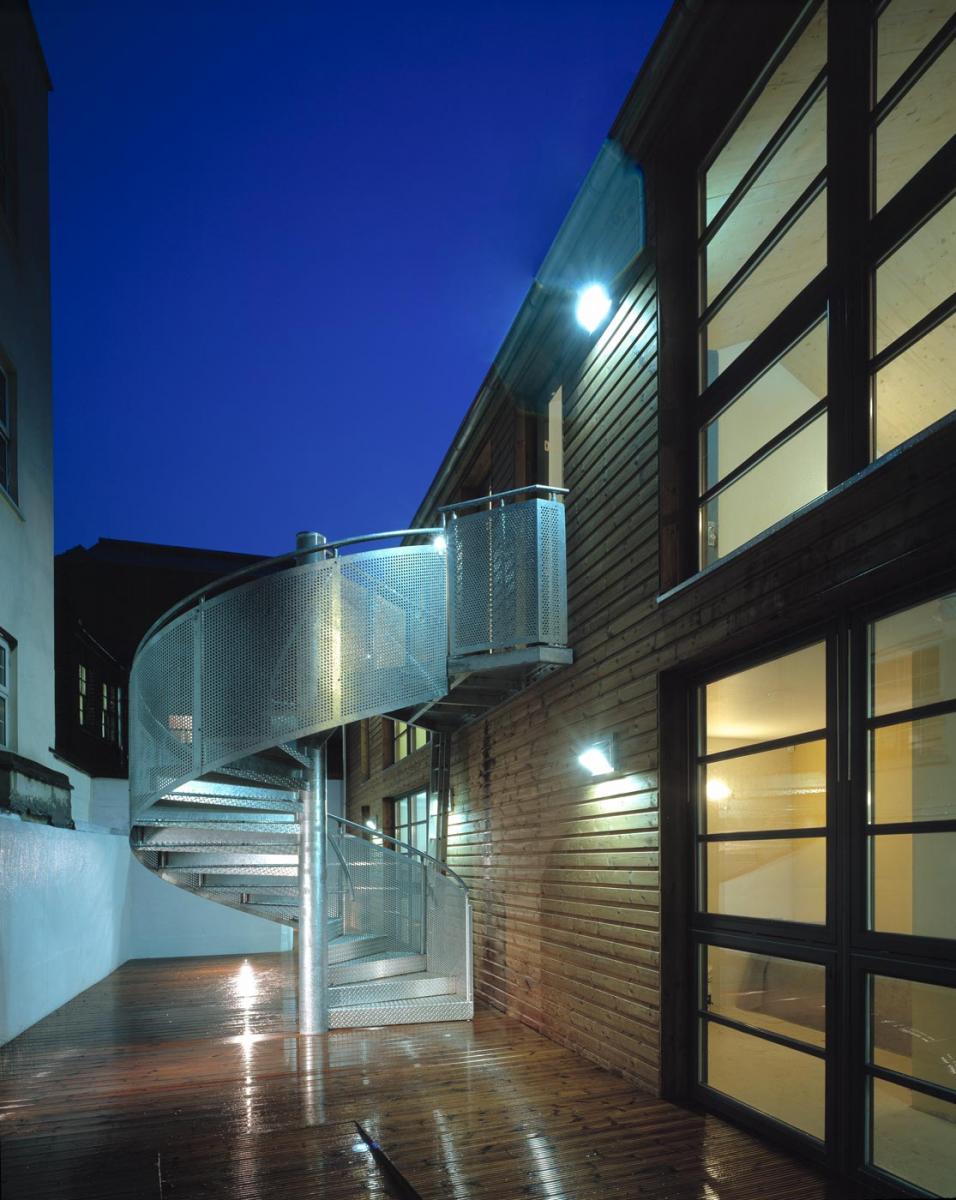 Carlisle Lane Flats, London - shared courtyard at night