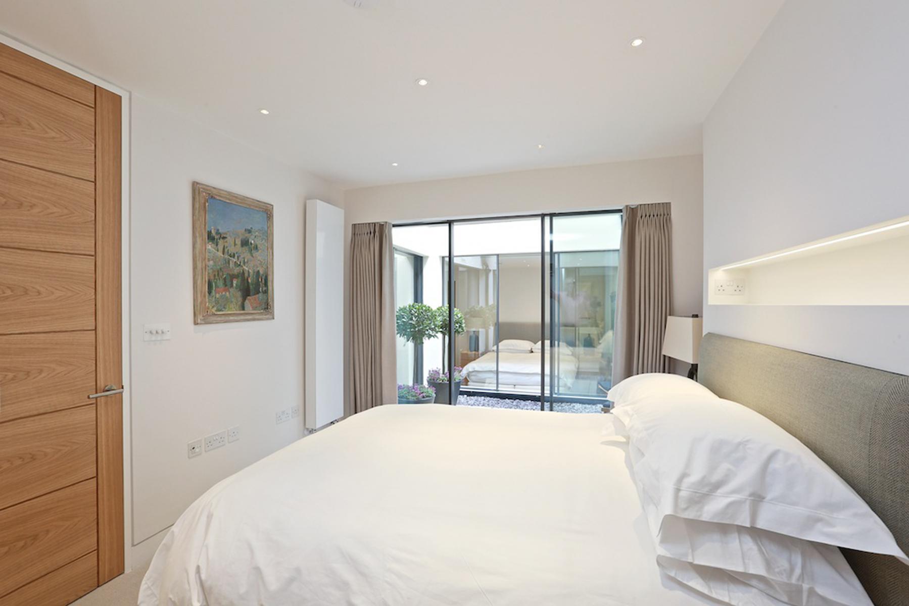 South Eaton Place Lower ground bedroom and courtyard